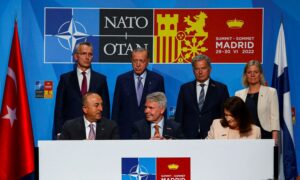 Foreign Ministers of Sweden, Finland, and Turkey sign a memorandum of understanding in the Spanish capital Madrid - June 2022 (Reuters)