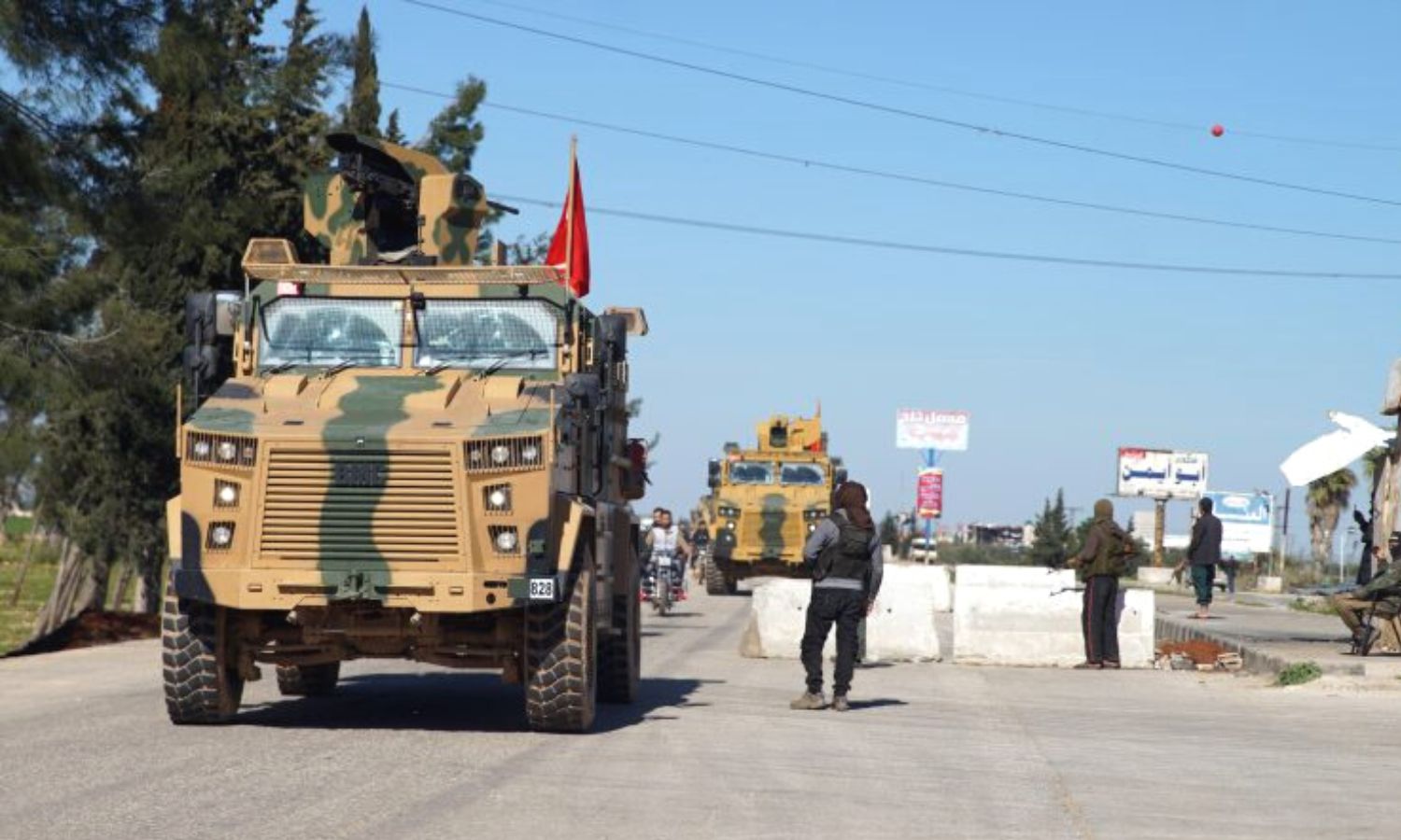 Turkish military vehicles on one of the main roads in Idlib city - 8 March 2019 (EPA)