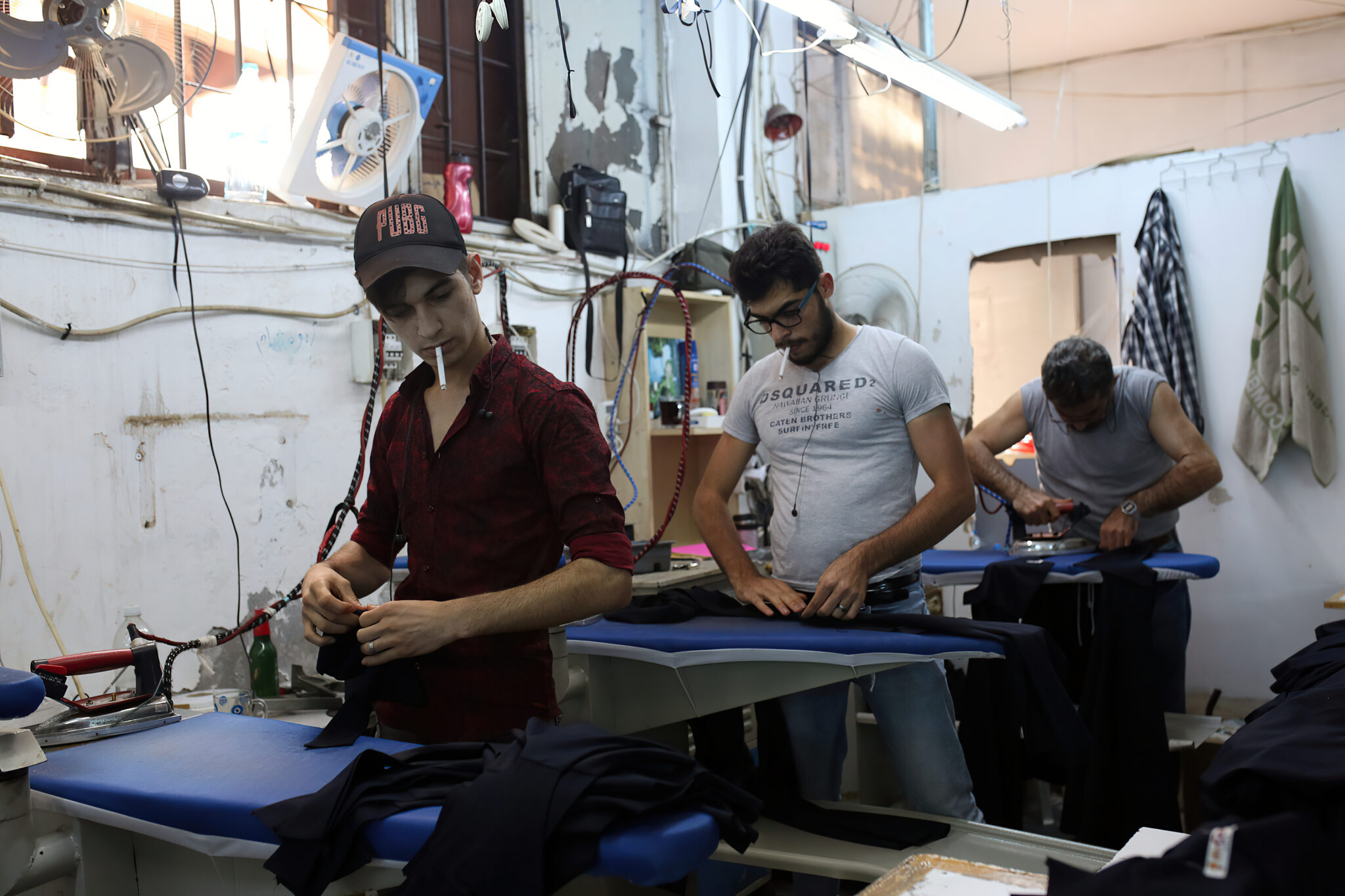 Syrian youths in a sewing workshop in the Zeytinburnu neighborhood in Istanbul - 15 July 2019 (Anadolu Agency)