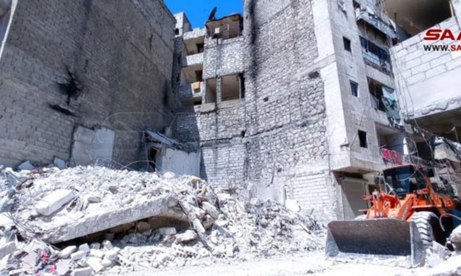 The collapsed building of al-Ferdous neighborhood - 8 September 2022 (SANA)