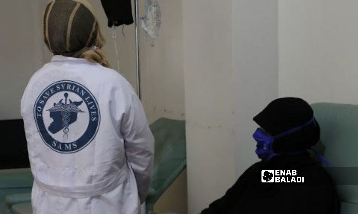 A woman visits a health center in Idlib (Enab Baladi/Huda al-Kulaib)