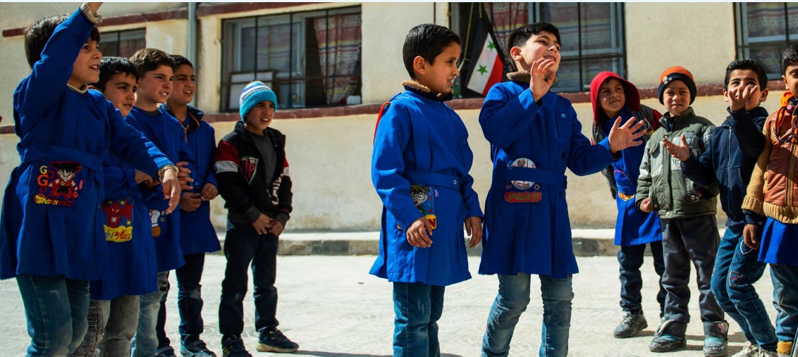 Students in the schoolyard in the regime-controlled areas - 10 May 2022 (UNICEF)