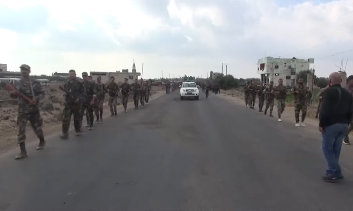 Syrian regime army soldiers deployed in the city of Jasim in the southern Daraa governorate according to the security settlement agreement - 4 October 2021 (Sputnik)