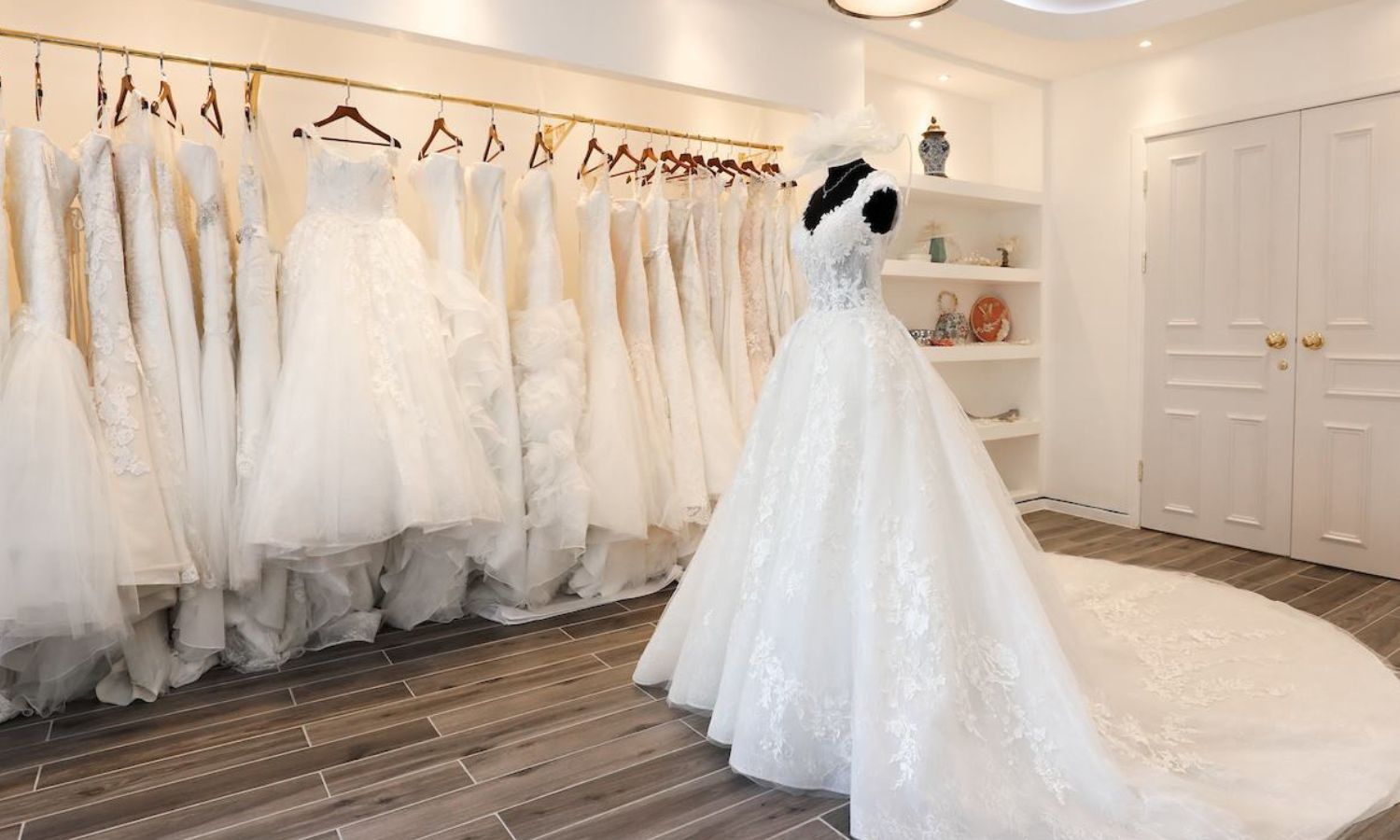 Wedding dresses hanging in one of their design and sale stores.