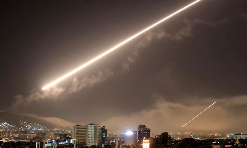 Syrian air defense system’s surface-to-air missile response following an Israeli bombing in the sky of Damascus - April 2018 (AP)