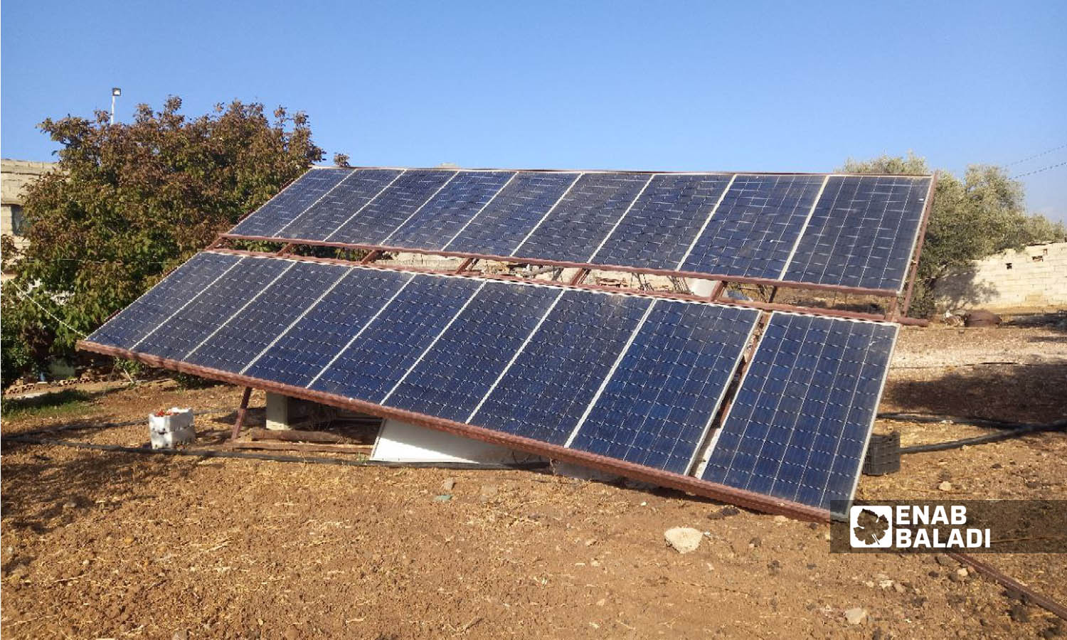 Solar panels inside a farm in Daraa governorate (Enab Baladi/Halim Muhammad)