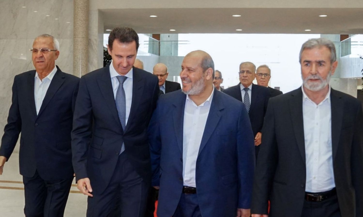 President of the Syrian regime, Bashar al-Assad, and member of the Hamas Political Bureau (Politburo), Khalil al-Hayya - 19 October 2022 (Syrian Presidency / Facebook)