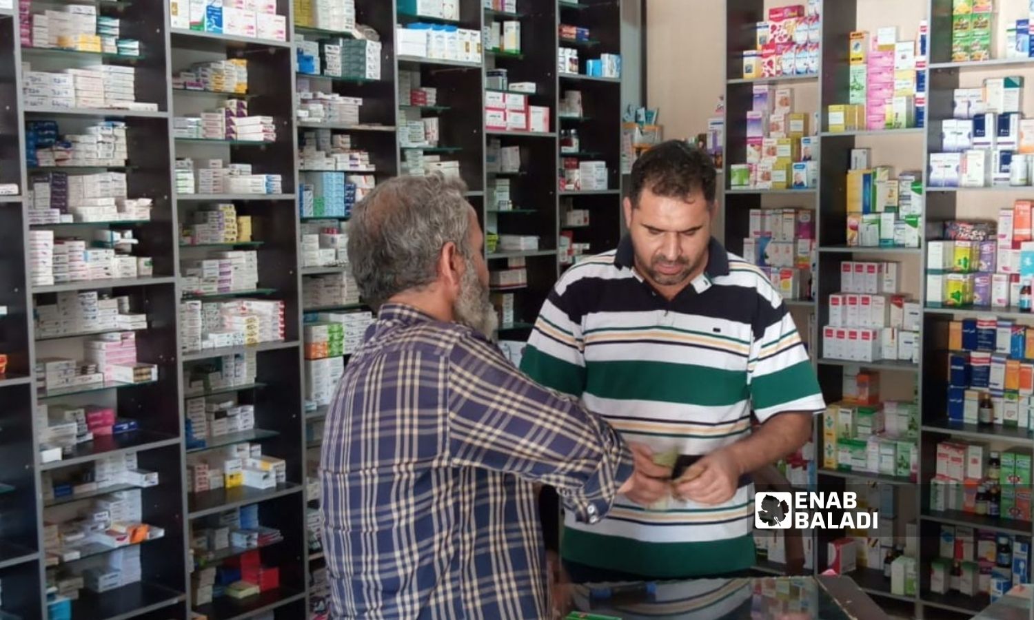 A person visits a pharmacy in the town of al-Dana in the northern countryside of Idlib to get medication - 25 October (al-Dana/Huda al-Kulaib)