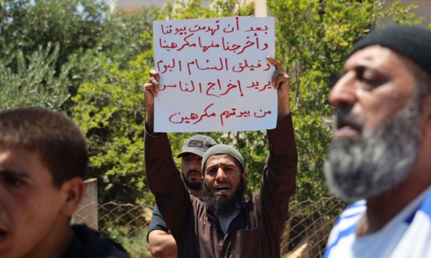 “Abu Abdullah al-Shami,” an IDP from Damascus countryside, during a demonstration against his eviction from the village of Foua in the northern countryside of Idlib - 24 June 2022 (local networks)