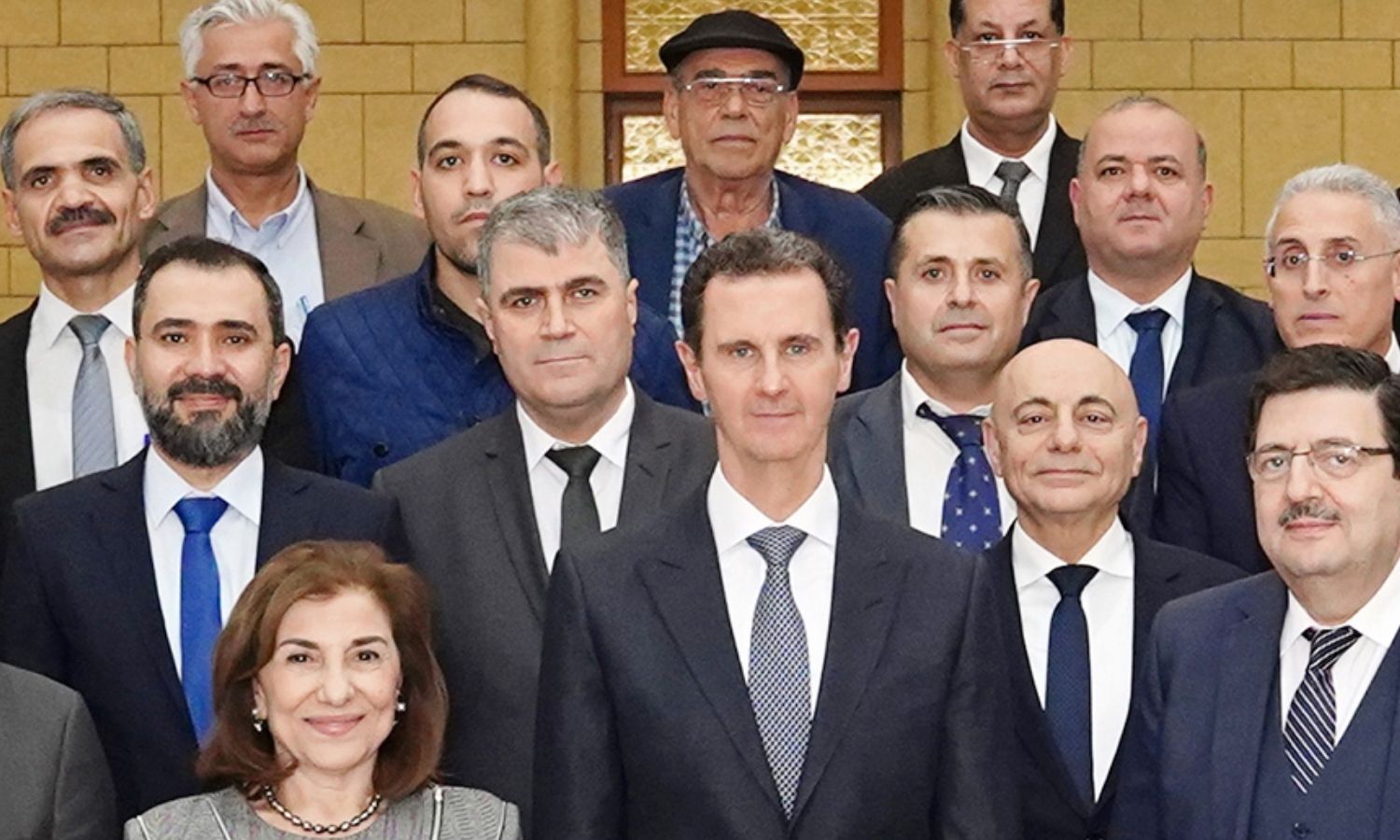 Head of the Syrian regime, Bashar al-Assad, media advisor Buthaina Shaaban, Information Minister, Boutros al-Hallaq (R) and media figures - 19 November 2022 (Facebook/Janbulat Shikay)