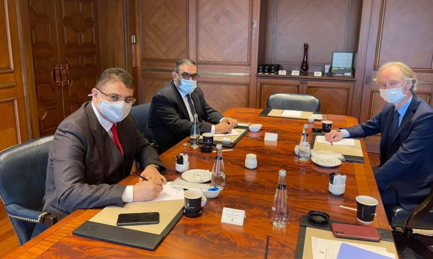 Anas al-Abdah, head of the Syrian Negotiations Committee, during his meeting with the UN envoy, Geir Pedersen, to discuss ways to activate Resolution 2254 - 2 March 2021 (Syrian National Coalition)