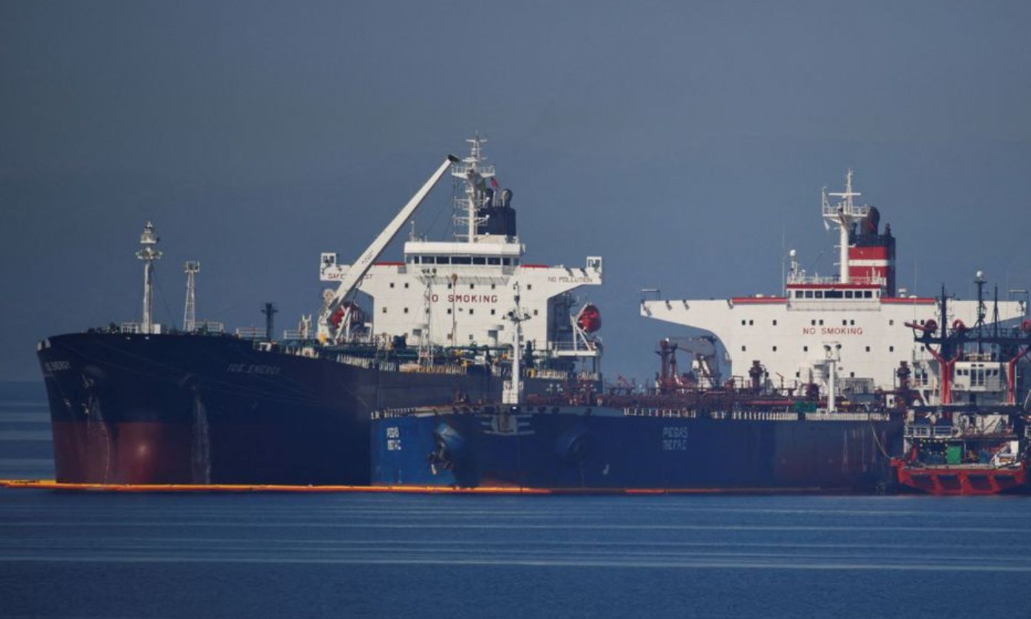 The Liberian-flagged Ice Energy oil tanker transports crude oil from the Iranian-flagged oil tanker Lana (formerly Pegas) off Karystos Beach in Greece - 26 May 2022 (Reuters)