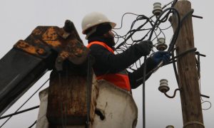 A worker at the AK energy electricity company carrying out maintenance works in the border town of Azaz in the northern Aleppo governorate - 18 January 2023 (AK energy/Facebook)