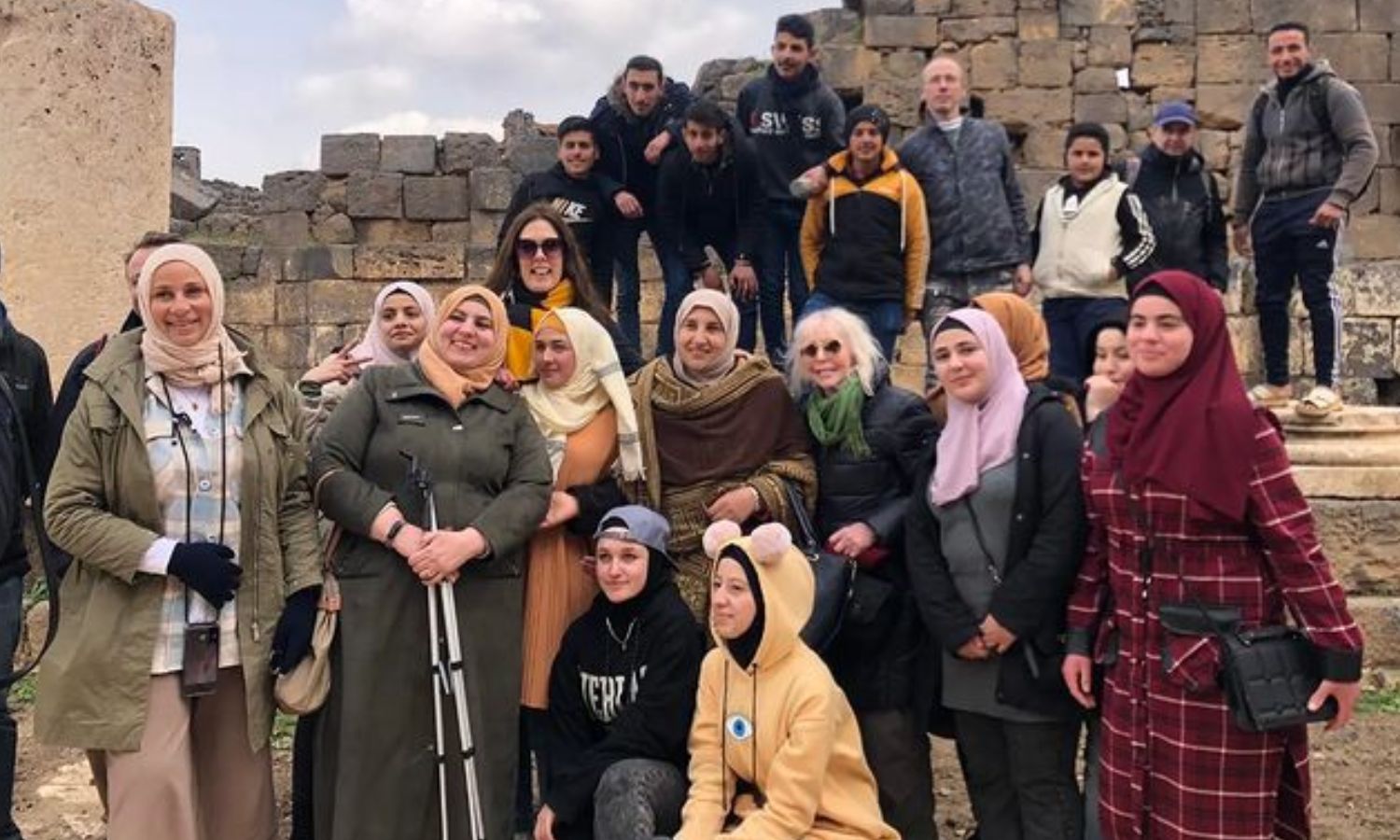 A tourist group in front of an archaeological site in Syria - 14 July 2022 (Young Pioneer Tours/Instagram)