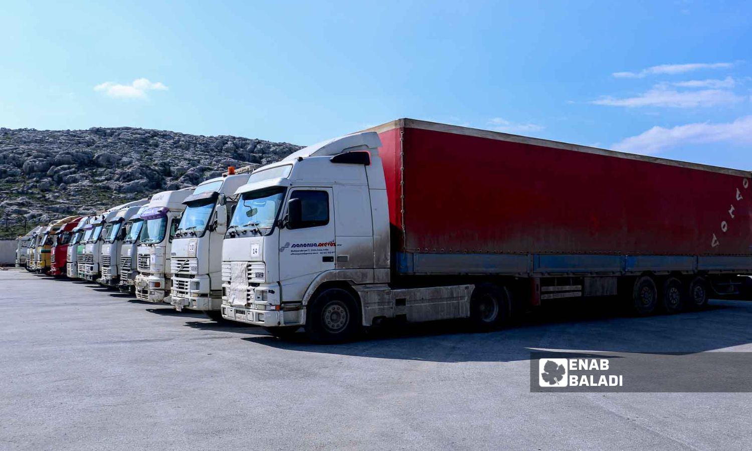 Trucks loaded with UN aid at Bab al-Hawa border crossing in Idlib - February 10, 2023 (Enab Baladi/Mohammad Nasan Dabel)
