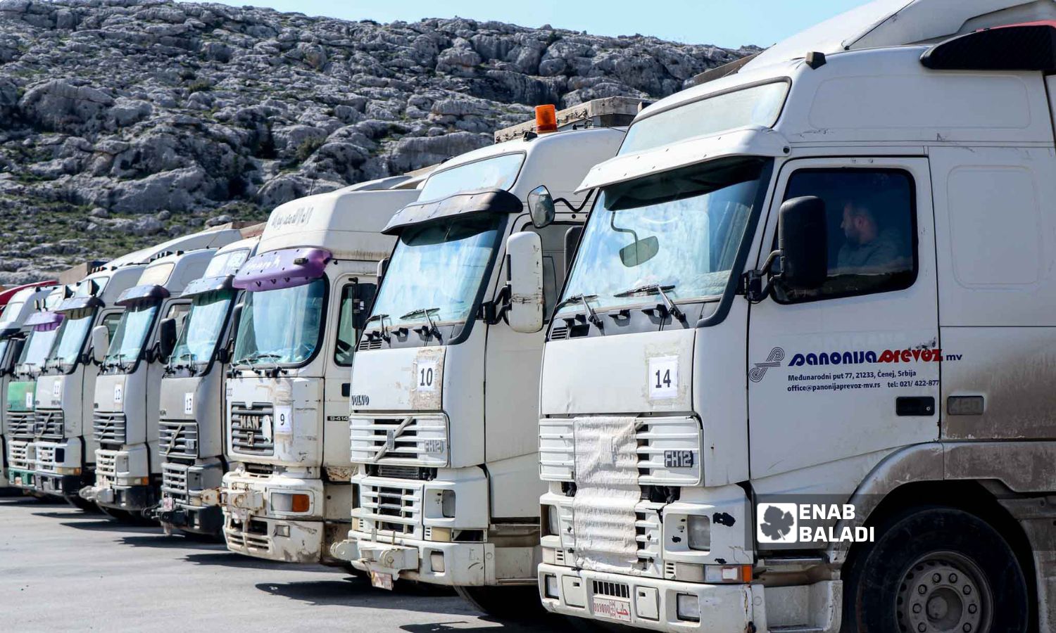 Trucks loaded with UN aid at Bab al-Hawa border crossing in Idlib - February 10, 2023 (Enab Baladi/Mohammad Nasan Dabel)
