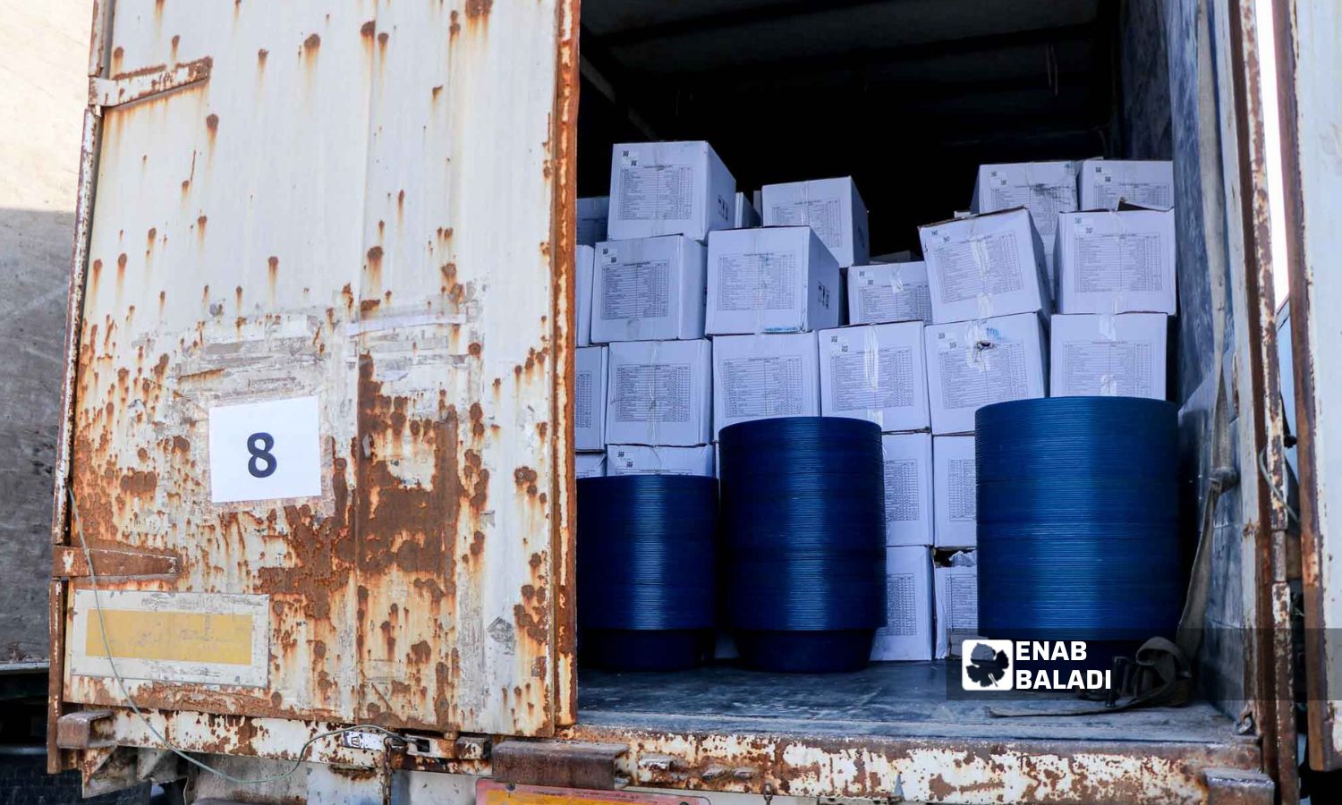 An UN-aid truck loaded with food baskets at the Bab al-Hawa border crossing in Idlib - February 10, 2023 (Enab Baladi / Mohammad Nasan Dabel)