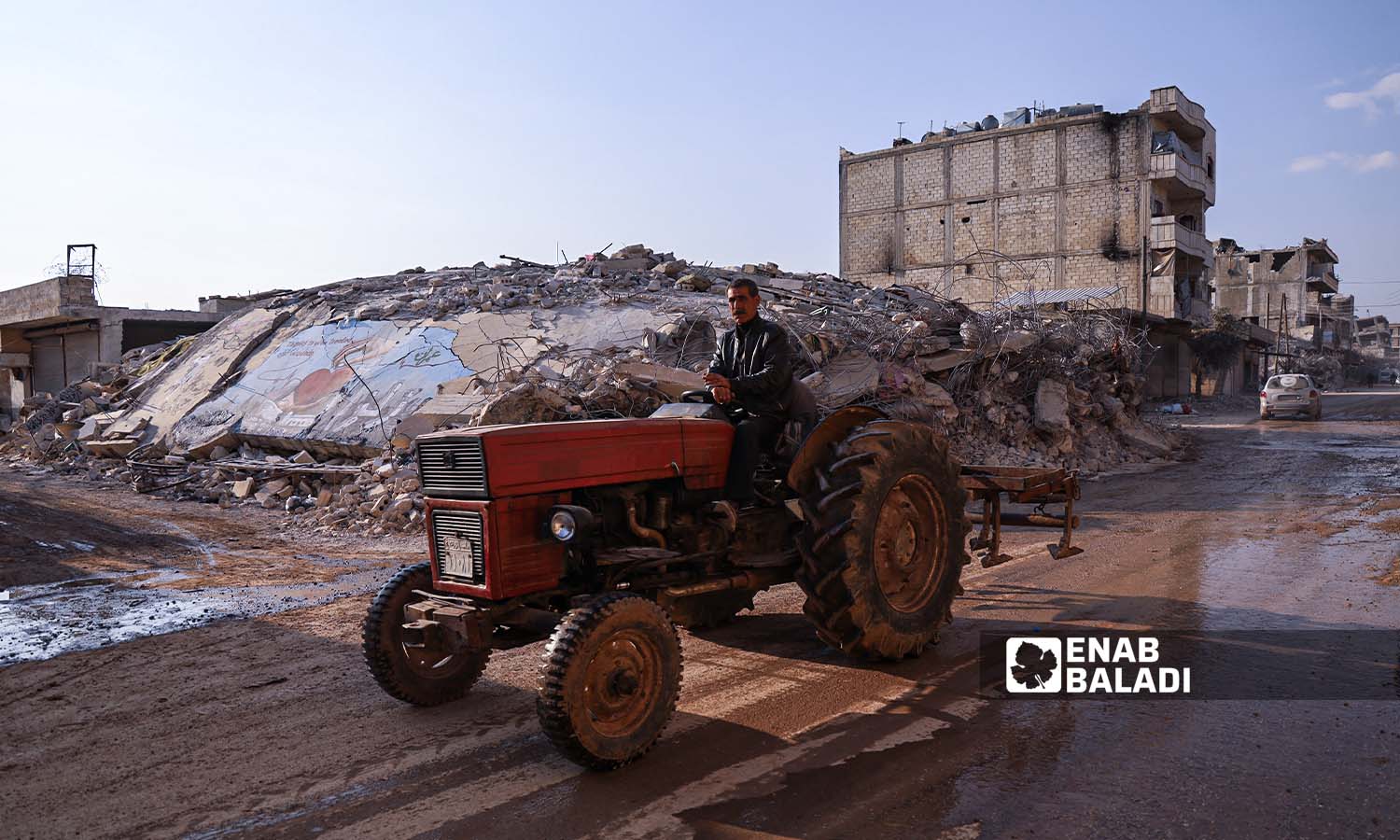 Debris of destroyed houses in the streets of Jindires town in Aleppo countryside, following the earthquake that hit northwestern Syria - February 24, 2023 (Enab Baladi/Amir Kharboutli)
