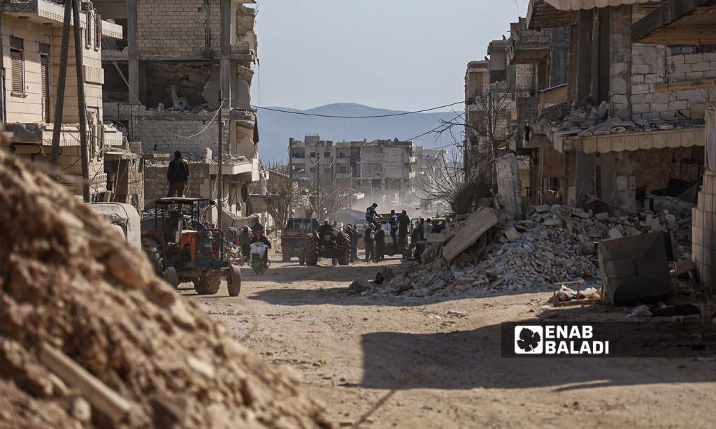 Debris of destroyed houses in the streets of Jindires town in Aleppo countryside, following the earthquake that hit northwestern Syria - February 24, 2023 (Enab Baladi/Amir Kharboutli)