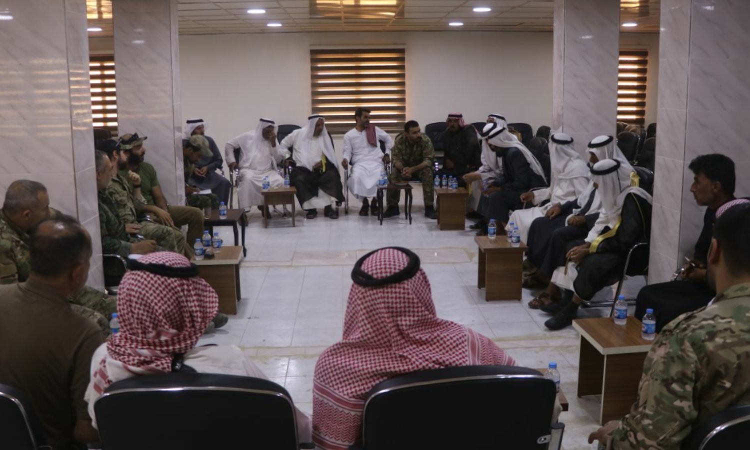 Representatives of the US-led International Coalition during their meeting with representatives of the security forces and tribal figures and notables in Deir Ezzor - 25 June 2021 (Deir Ezzor Media Center/Facebook)