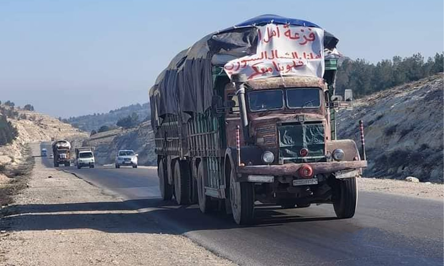 Aid trucks sent by the tribes of Deir Ezzor to the earthquake-affected areas in northwestern Syria - February 13, 2023 (Facebook/Hassan Majed)