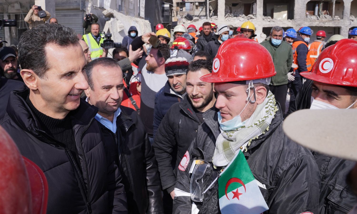 Bashar al-Assad, head of the Syrian regime, at a quake-hit site in the al-Masharqa neighborhood in northern Aleppo city - February 10, 2023 (Facebook/Syrian Presidency)