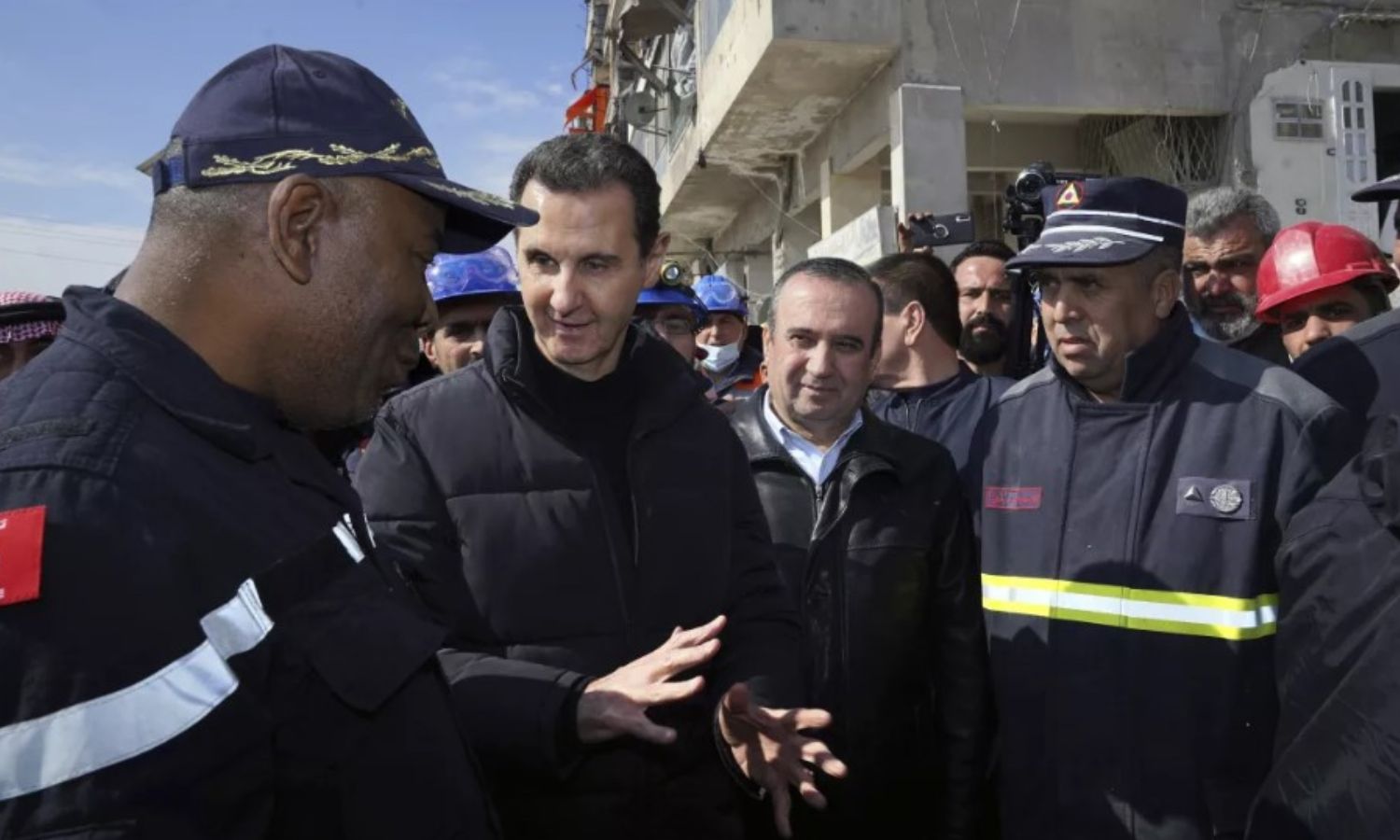 Bashar al-Assad, head of the Syrian regime, during his visit to the affected areas in northern Aleppo city on the fifth day of the earthquake - February 10, 2023 (AP)