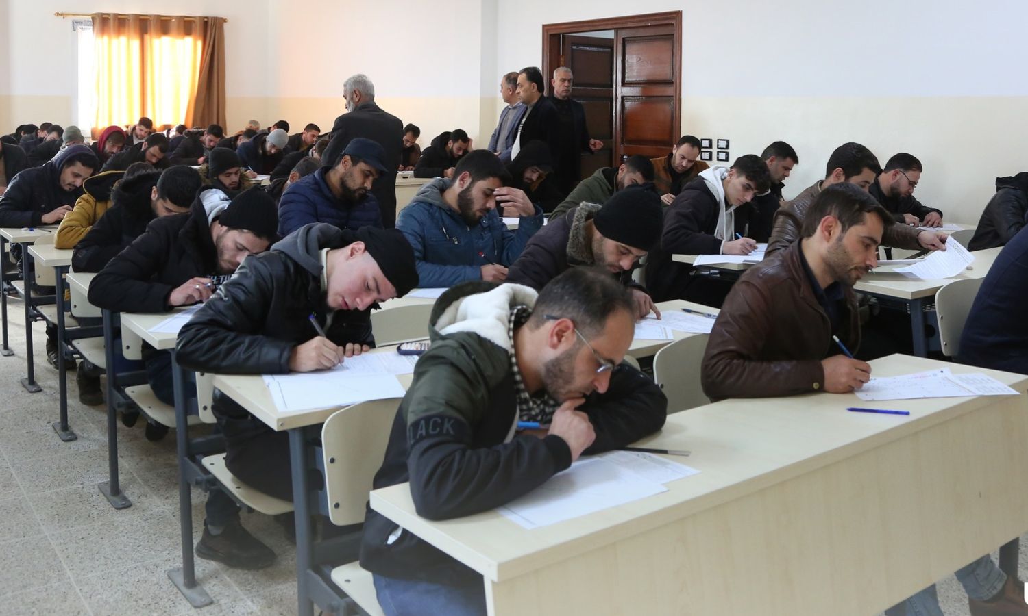 Students taking first semester exams at Free Aleppo University in the border Azaz town, in the northern Aleppo countryside - January 2023 (Facebook/Free Aleppo University)