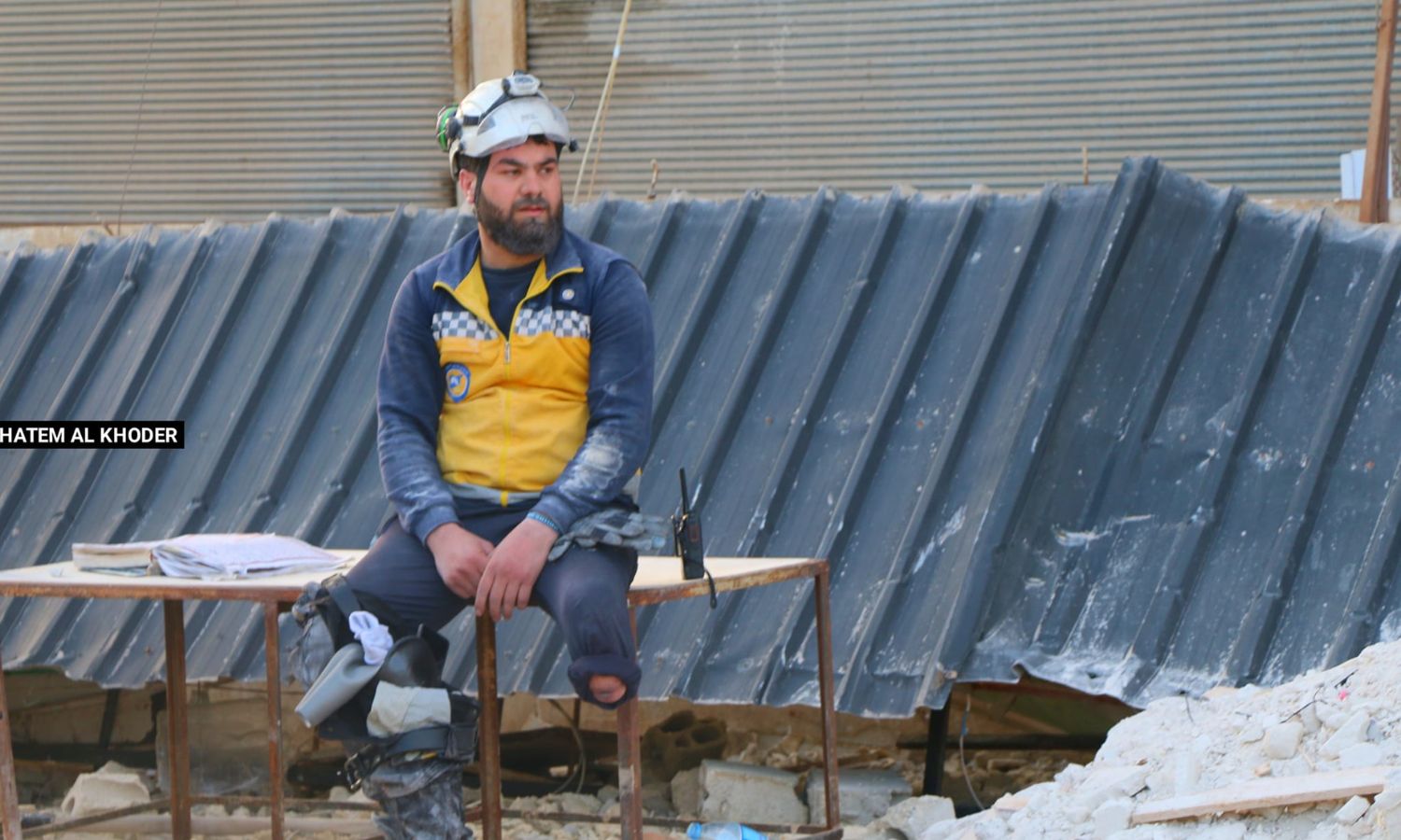 White Helmets volunteer Hassan al-Talfah, with his prosthetic foot, contributed to the rescue operation in Idlib countryside following the Feb.6 earthquake. February 2023 (Facebook/Hatem al-Khader)