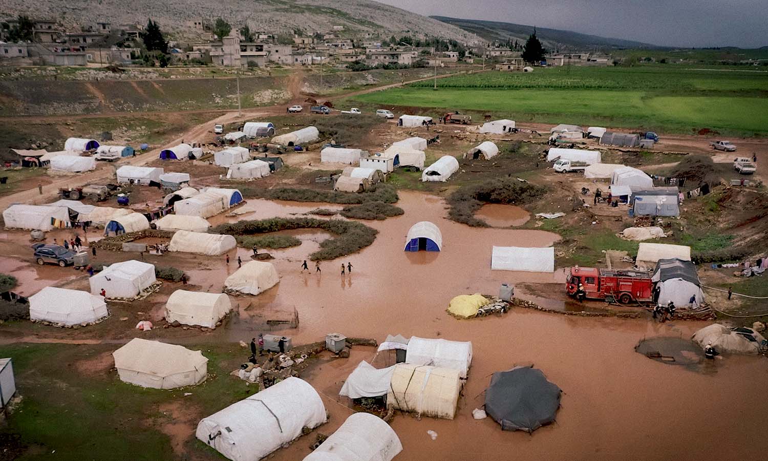 Rain floods the IDP camps in northwestern Syria - March 19, 2023 (Facebook/Syria Civil Defense)