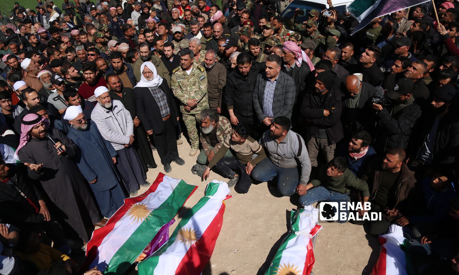 Minister of Defense in the Syrian Interim Government (SIG), Hassan Hamada, during the funeral of four Kurdish civilians who were killed during the celebration of Nowruz in the city of Jindires in the northern countryside of Aleppo - March 21, 2023 (Enab Baladi/Amir Kharboutli)