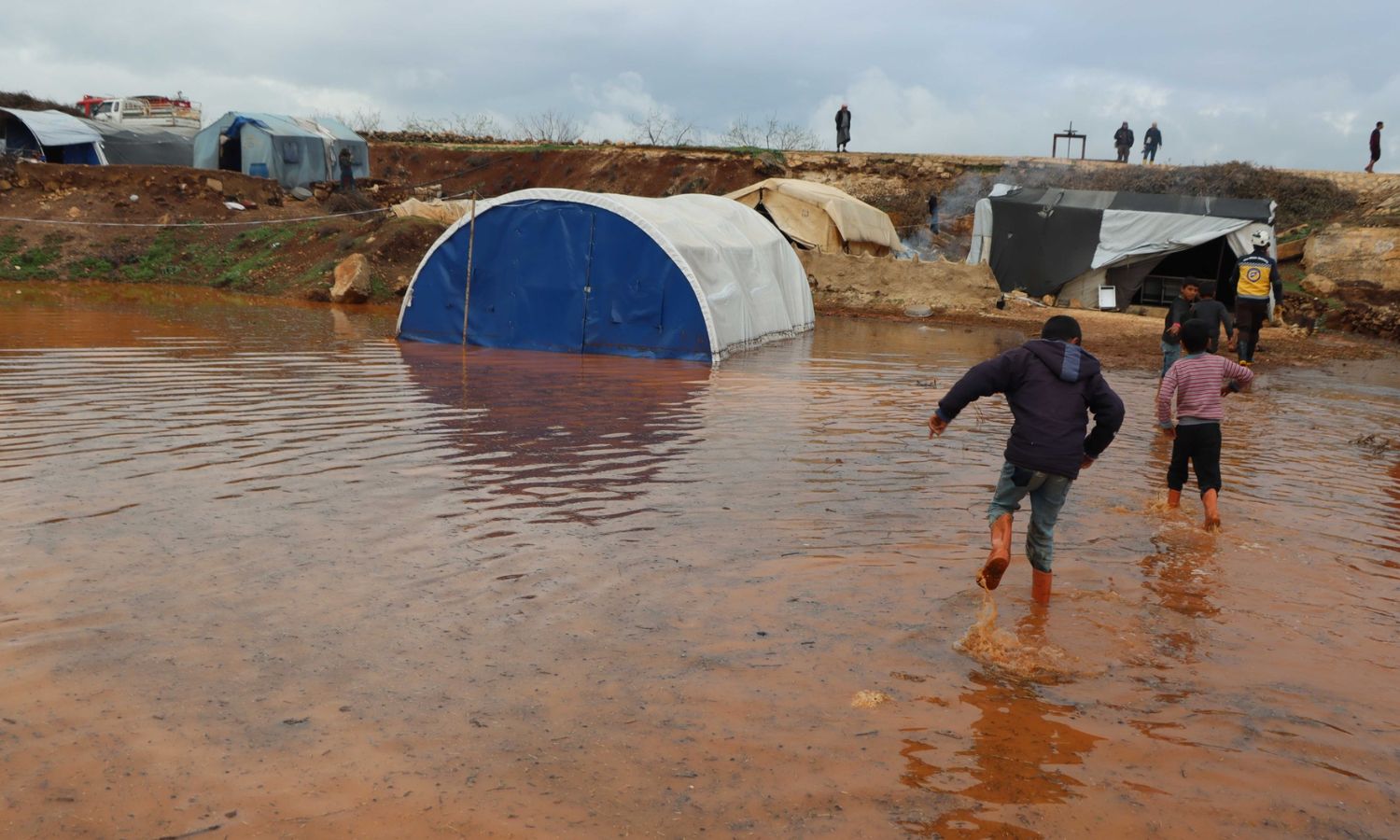 Rain floods the IDP camps in northwestern Syria - March 19, 2023 (Facebook/Syria Civil Defense)