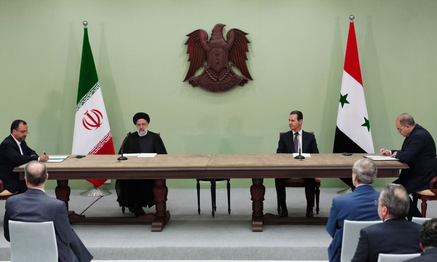 Signing memorandums of understanding between the Syrian regime and Iran, in the presence of al-Assad and Iranian President Ibrahim Raisi in Damascus - May 3, 2023 (Syrian Presidency)