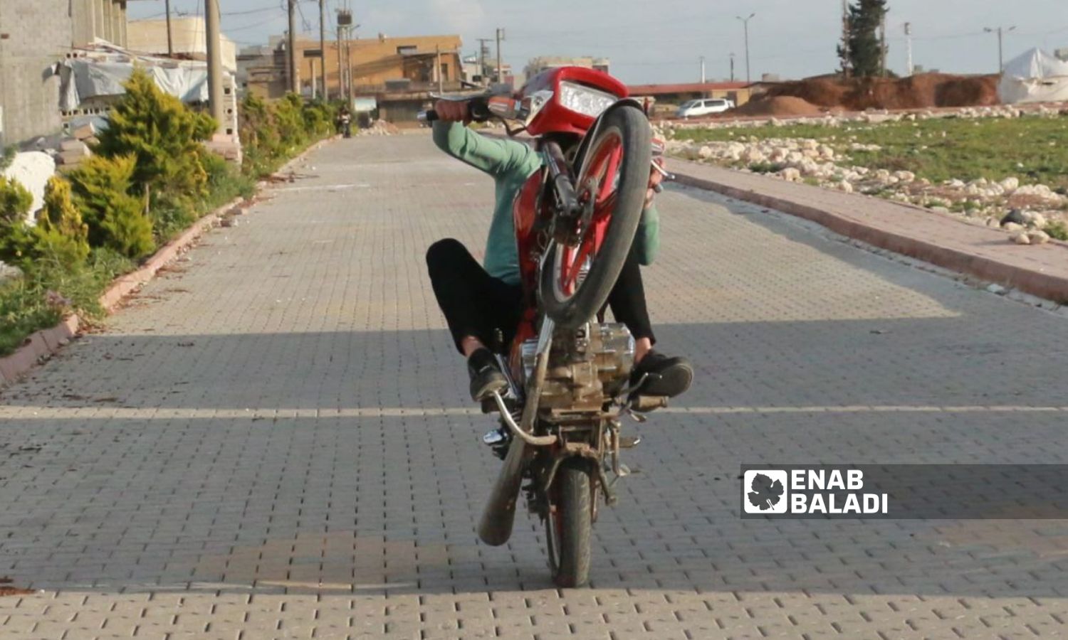 A local stunt rider in the northern countryside of Aleppo - April 28, 2023 (Enab Baladi/Dayan Junpaz)