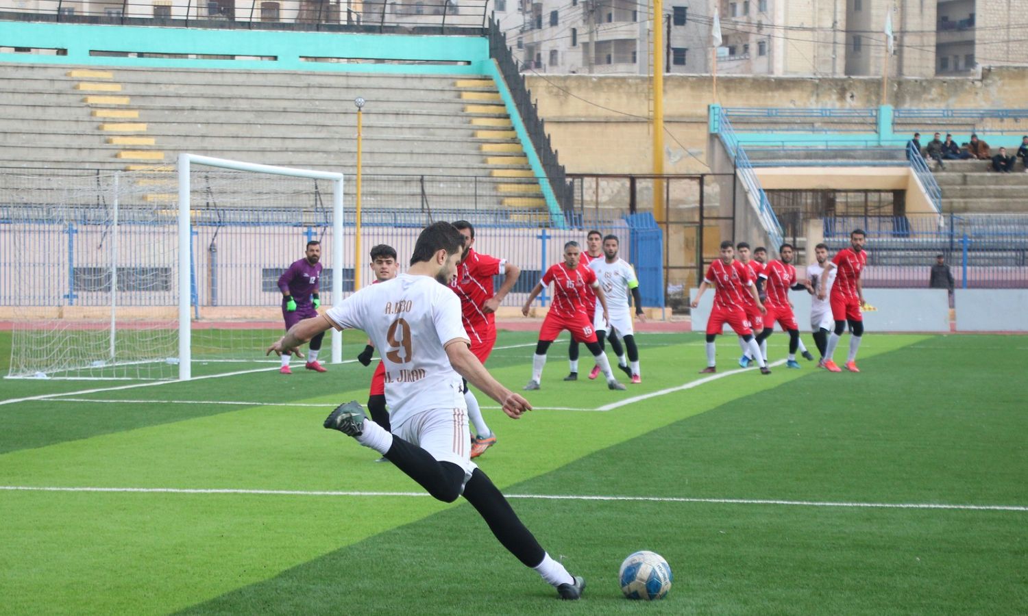 Players of al-Jihad Club and Taftanaz Club during a match in the sixth week of the Football League First Division in Idlib - February 4, 2023 (Free Syrian Football Federation)