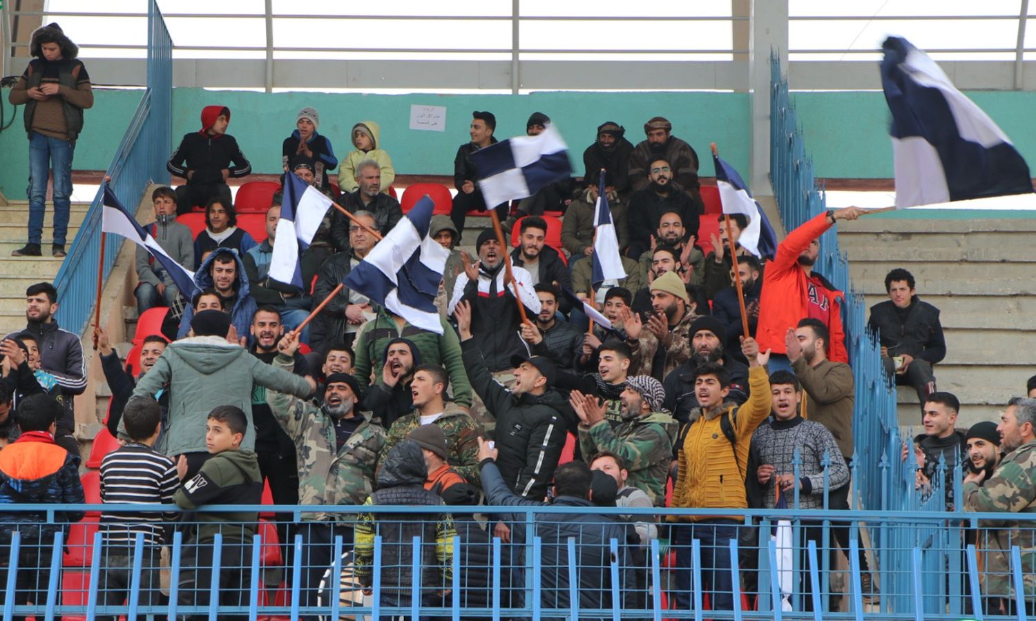 Fans at Idlib Municipal Stadium attend a match between Saraqib Club and Maarat Misrin Club in the First Division Football League - January 7, 2023 (Free Syrian Football Federation)