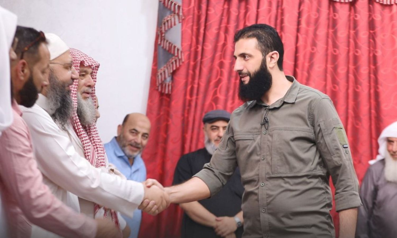 Abu Mohammad al-Jolani, HTS leader, meets with notables and senior figures of Idlib region – July 11, 2022 (Amjad media)