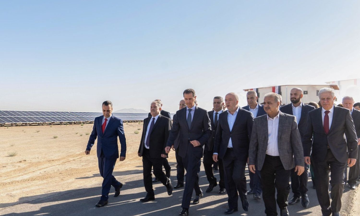 The head of the Syrian regime, Bashar al-Assad, next to businessman Badih al-Droubi during the opening of the solar power plant in Adra Industrial City east of Damascus - September 2022 (Syrian Presidency)