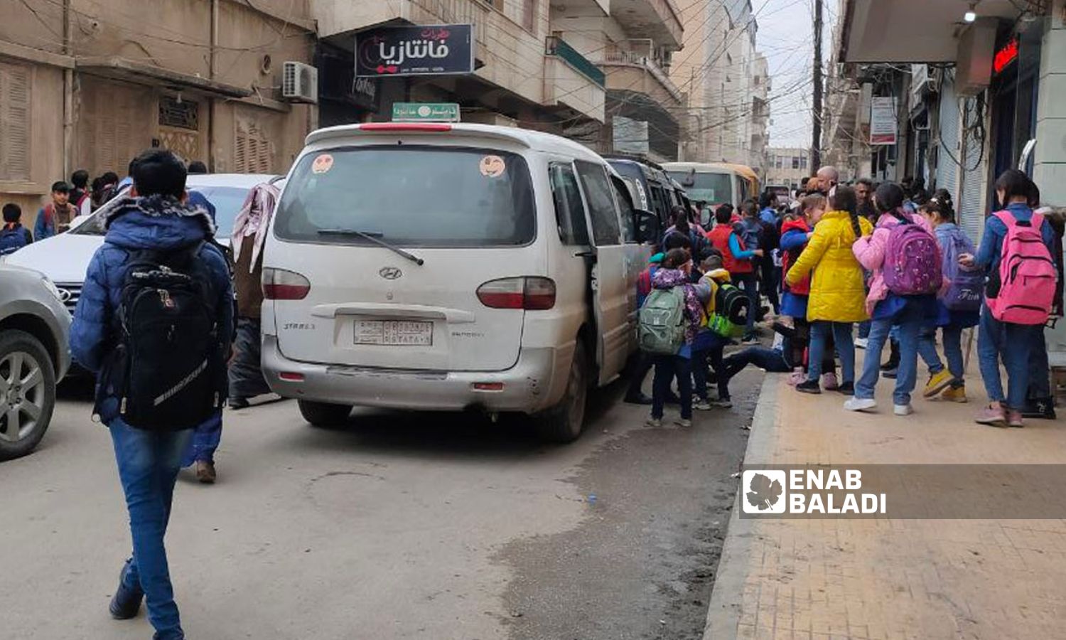 School students taking a private car in the city of Qamishli to take them to their schools - February 1, 2023 (Enab Baladi / Majd al-Salem)