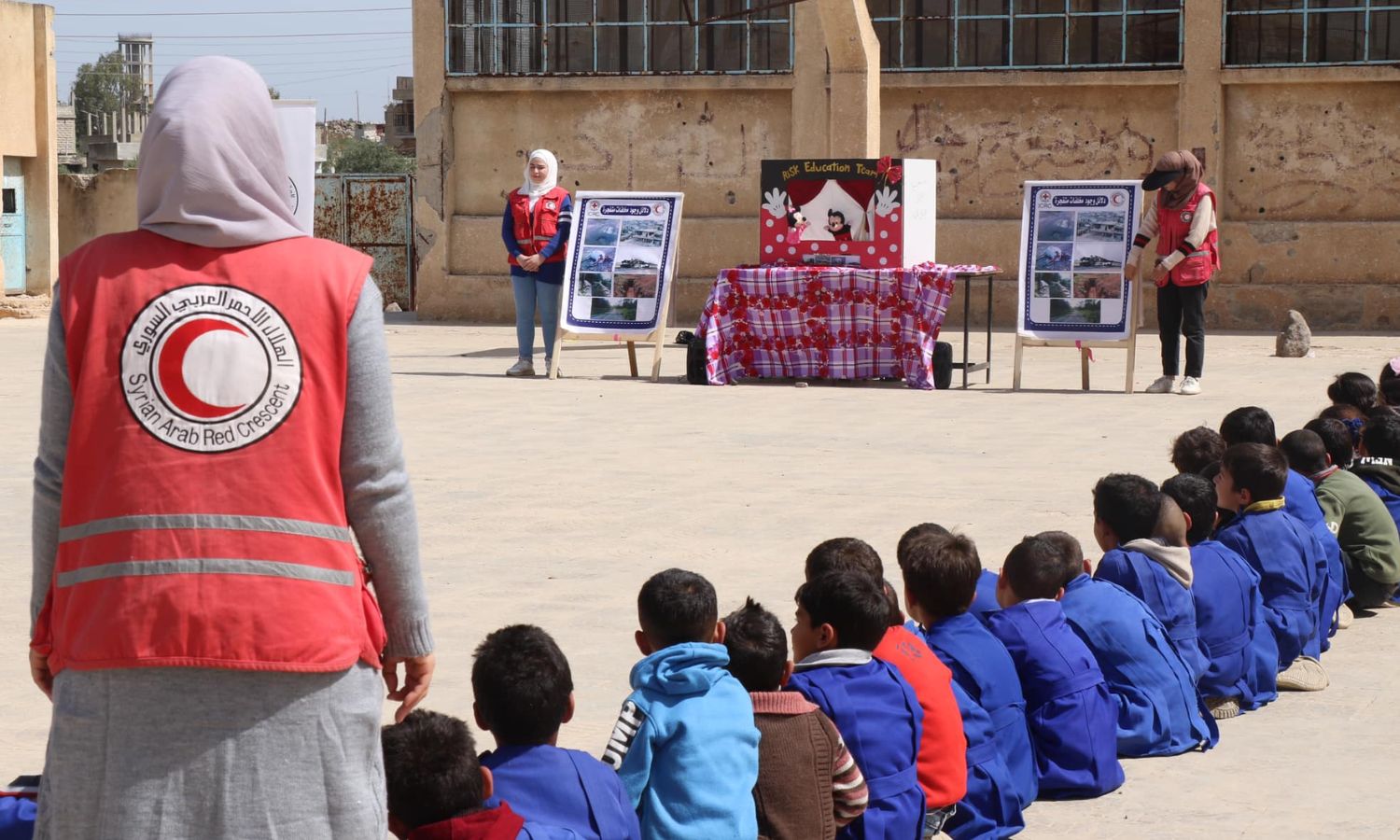An event for the Syrian Red Crescent to warn of the danger of war remnants in southern Daraa city, April 11, 2023 (Facebook/Syrian Red Crescent)