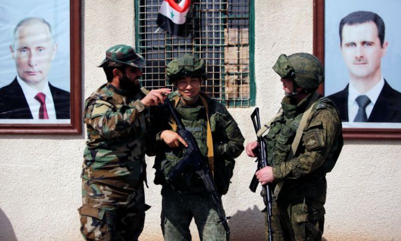Russian and Syrian regime soldiers in Damascus - 2018 (Reuters)