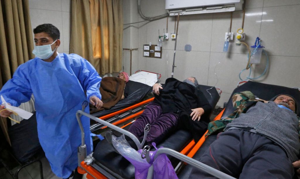 A Syrian doctor at al-Mouwasat Hospital in Damascus - 2021 (AFP)