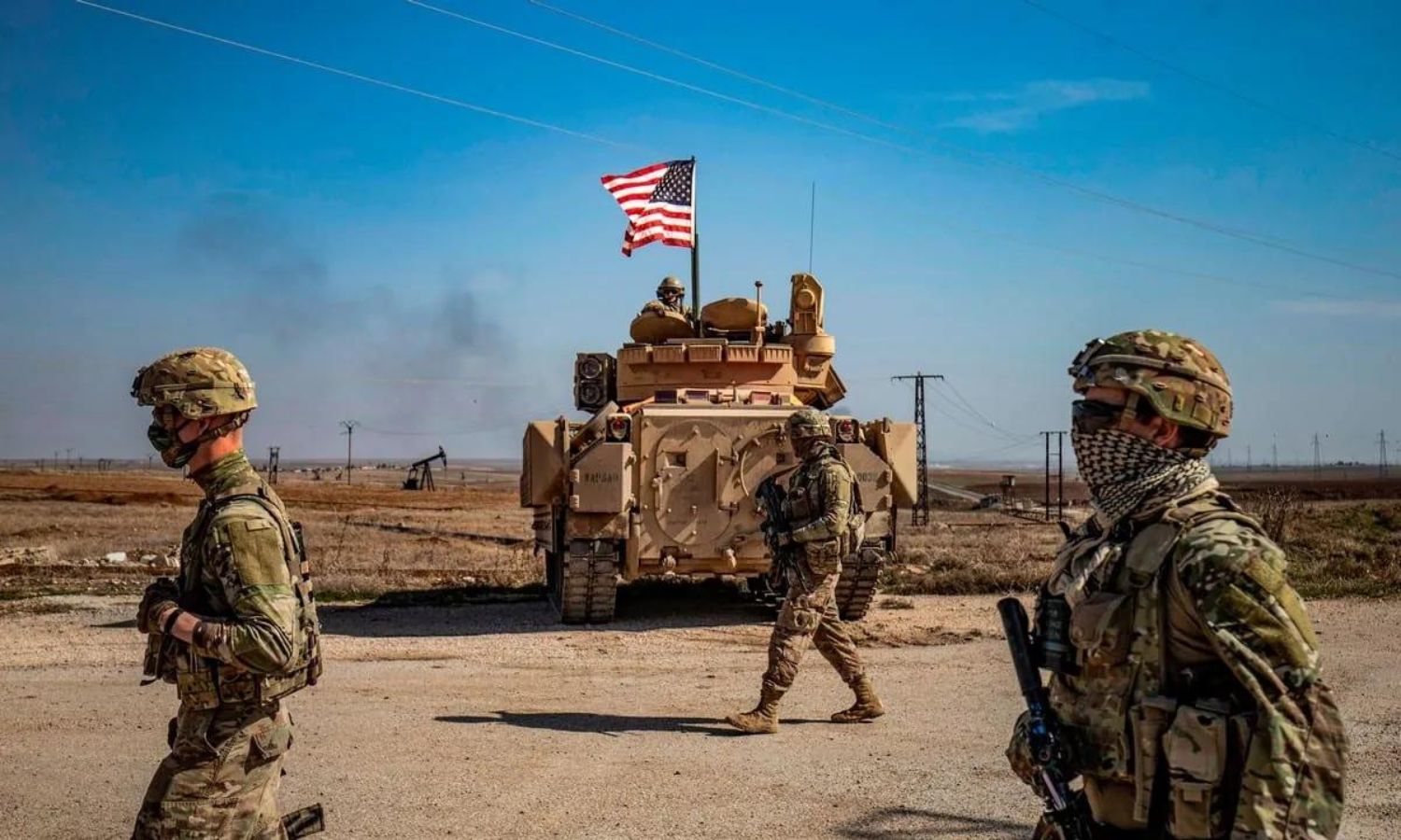 A patrol of American forces in the oil fields in Suwaidiyeh in al-Hasakah governorate, northeastern Syria - February 13, 2021 (AFP)