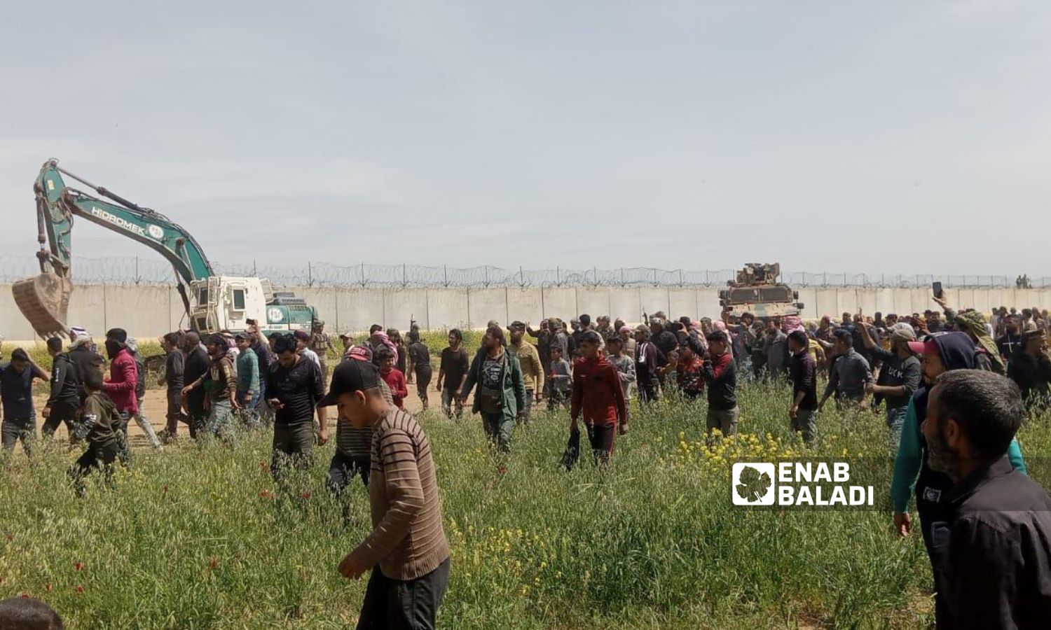 Farmers protest against the digging of a military trench within their land in the countryside of Ras al-Ain, northeastern Syria - April 18, 2023 (Enab Baladi/Hussein Shaabo)
