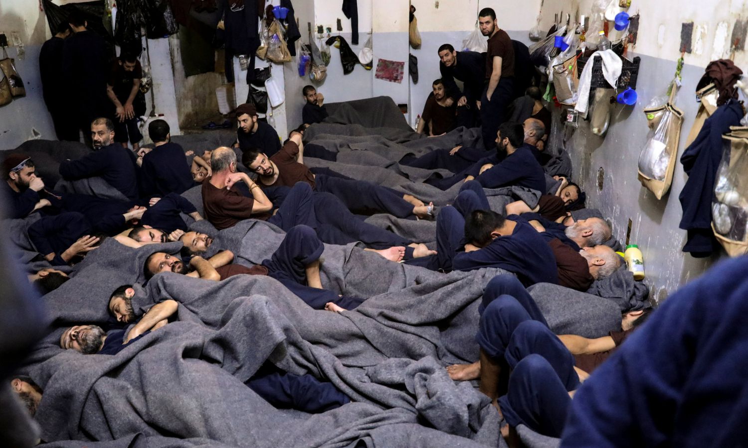 Prisoners suspected of belonging to the Islamic State group in a jail in northeastern al-Hasakah governorate - January 2020 (Reuters/Goran Tomasevic)