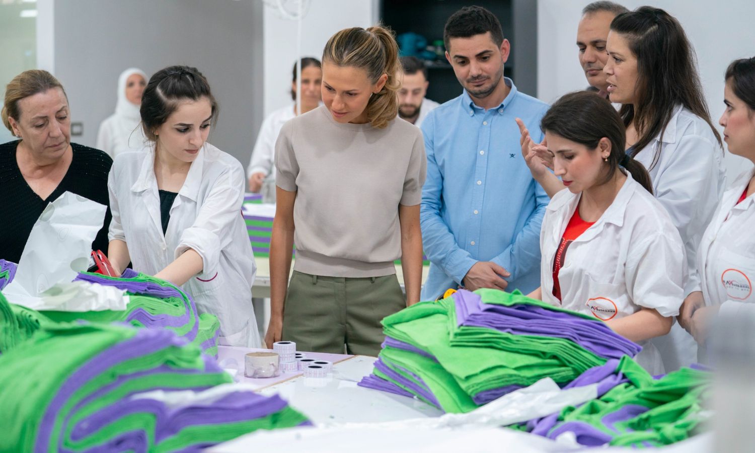 Asma al-Assad, the wife of the head of the Syrian regime, visits a clothing factory in rural Tartus - August 6, 2023 (SANA)