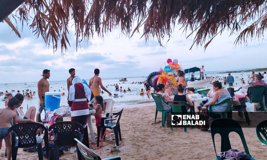 Karnak Beach offers cheaper services compared to resorts, but it is still beyond the reach of the majority of the people of Latakia city - August 12, 2023 (Enab Baladi/Linda Ali)