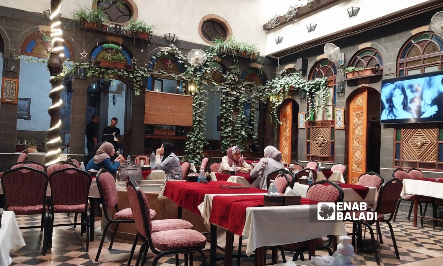 A cafe in an old Damascene house in the Bab Touma neighborhood in Damascus - July 11, 2023 (Enab Baladi/Sarah al-Ahmad)