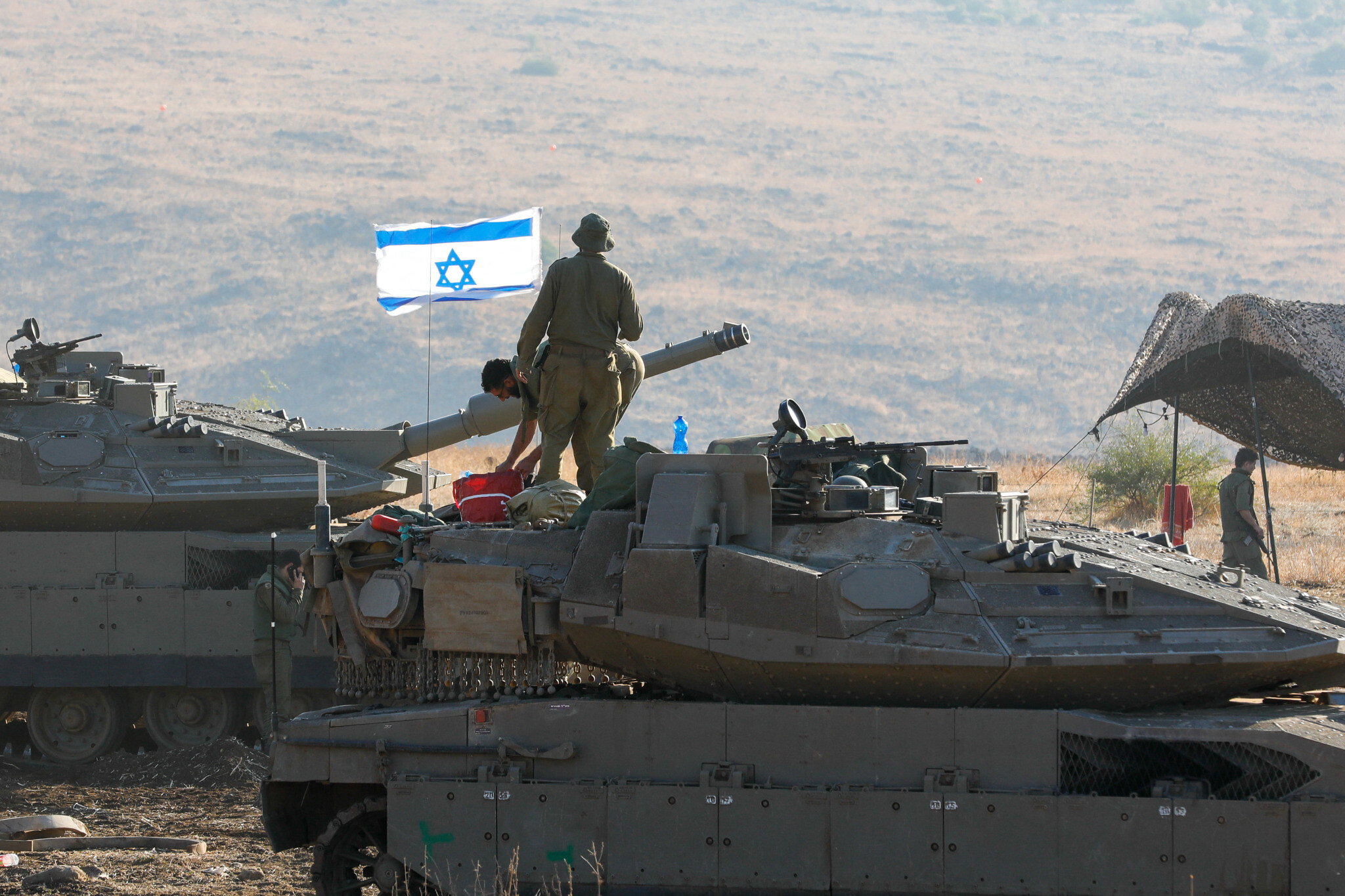 Israeli tanks stationed near the border with Lebanon - October 15, 2023 (AFP)