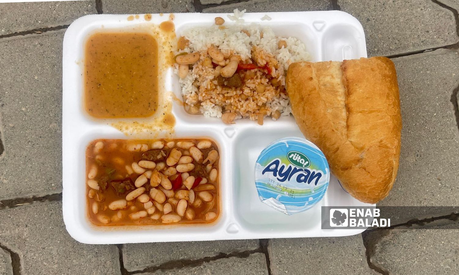 A lunch meal in the Turkish Maraş camp - September 12, 2023 (Enab Baladi)